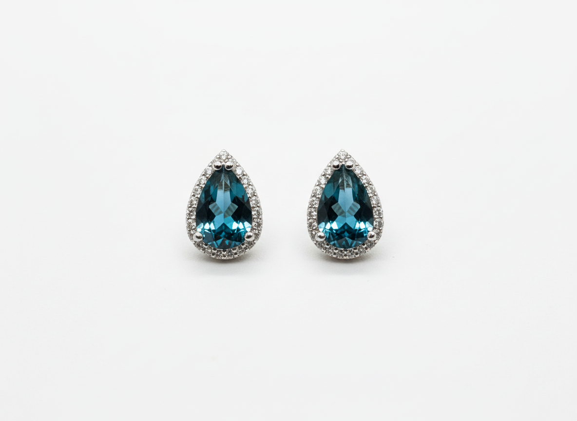 Deep Ocean Brilliance: Natural London Blue Topaz Halo Stud Earrings in 925 Silver