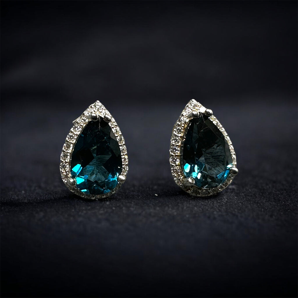 Deep Ocean Brilliance: Natural London Blue Topaz Halo Stud Earrings in 925 Silver
