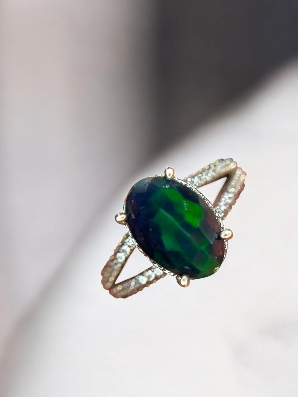Aurora Borealis: Oval Black Opal Cocktail Ring with Pavé Split Band