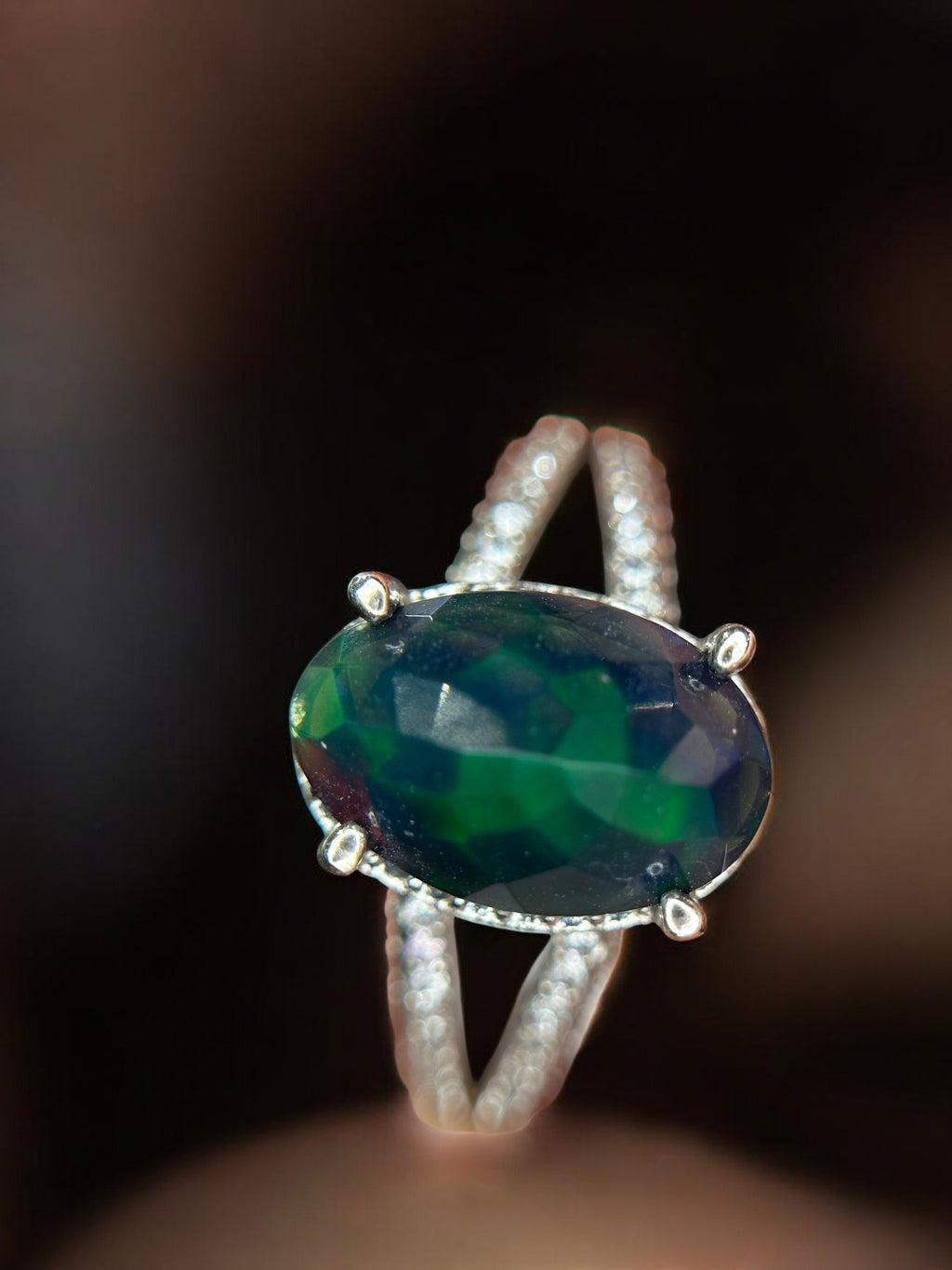 Aurora Borealis: Oval Black Opal Cocktail Ring with Pavé Split Band
