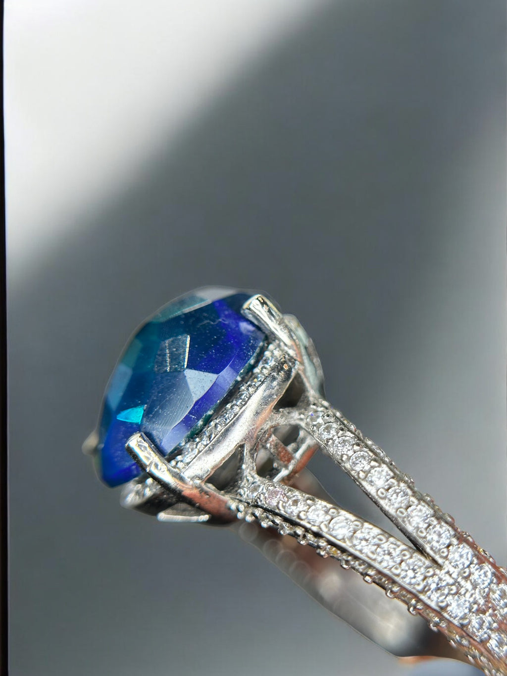 Aurora Borealis: Oval Black Opal Cocktail Ring with Pavé Split Band