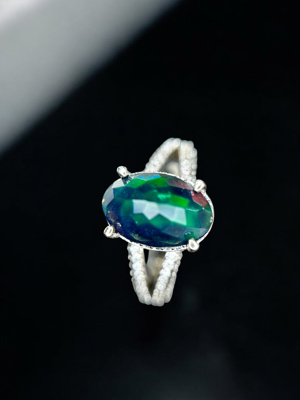 Aurora Borealis: Oval Black Opal Cocktail Ring with Pavé Split Band