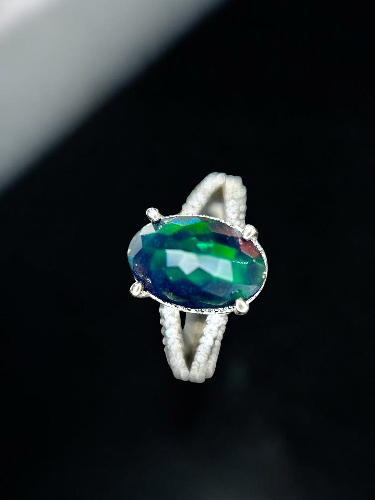 Aurora Borealis: Oval Black Opal Cocktail Ring with Pavé Split Band