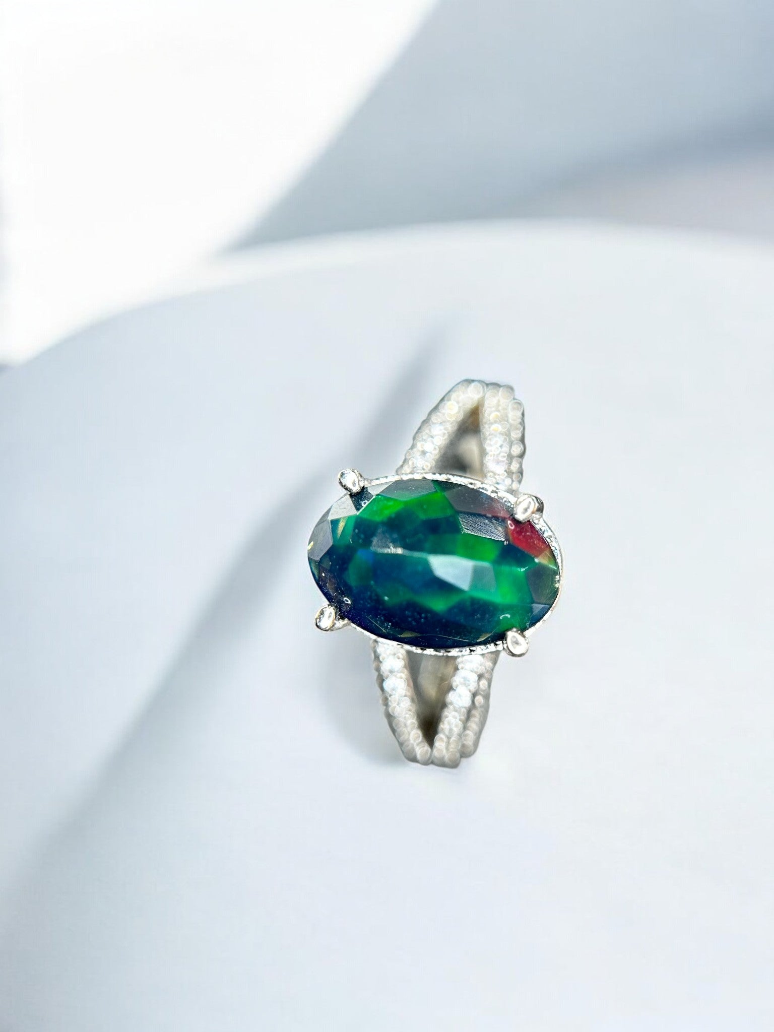 Aurora Borealis: Oval Black Opal Cocktail Ring with Pavé Split Band