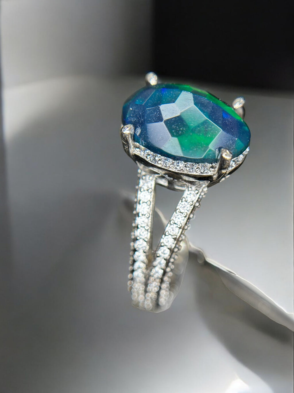 Aurora Borealis: Oval Black Opal Cocktail Ring with Pavé Split Band