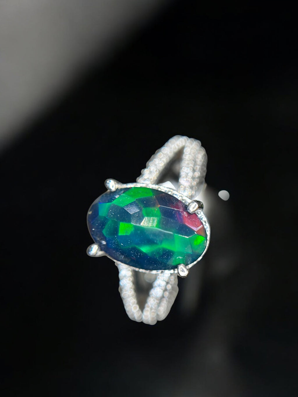 Aurora Borealis: Oval Black Opal Cocktail Ring with Pavé Split Band
