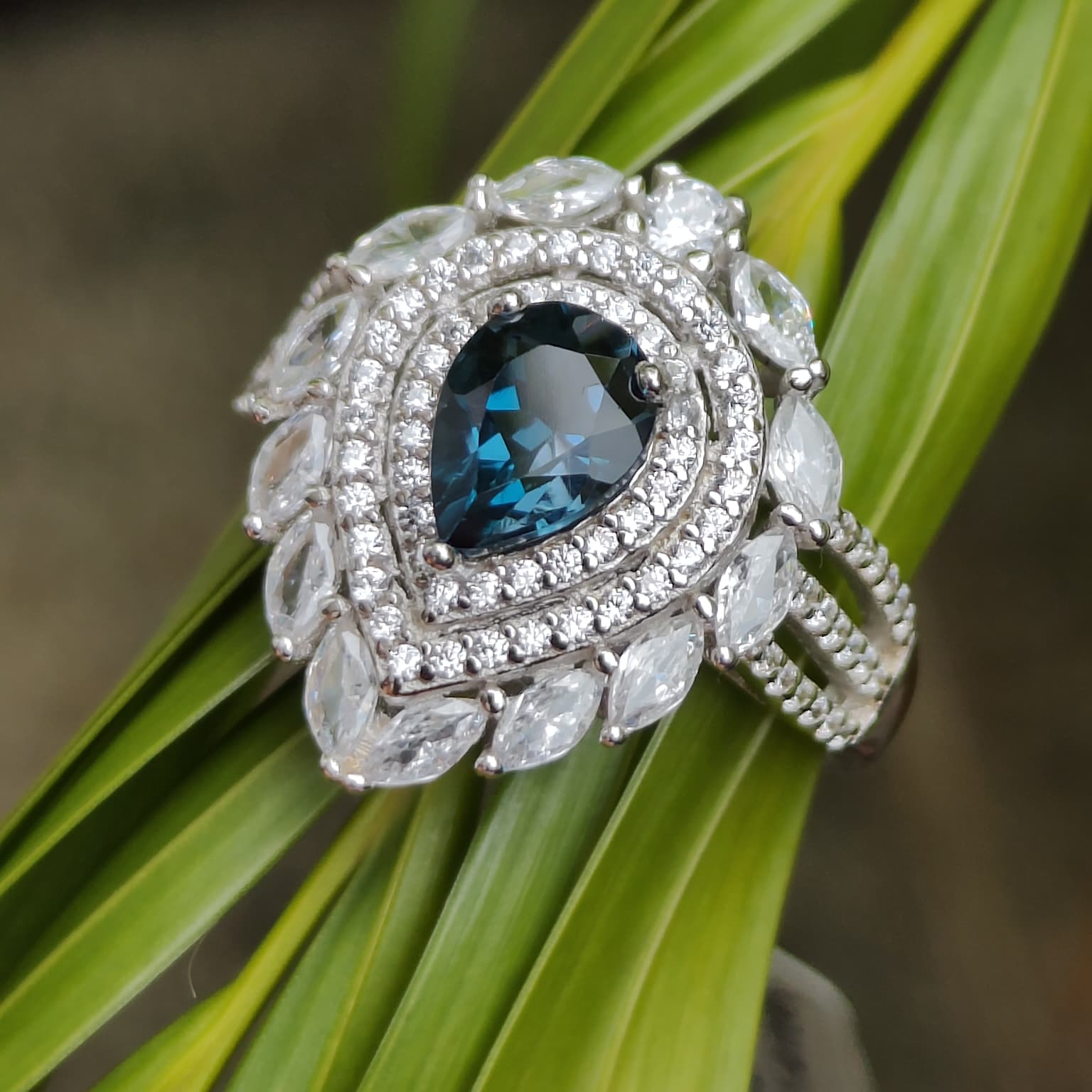 Inky Depths: Natural London Blue Topaz & CZ Statement Ring with Marquise Halo