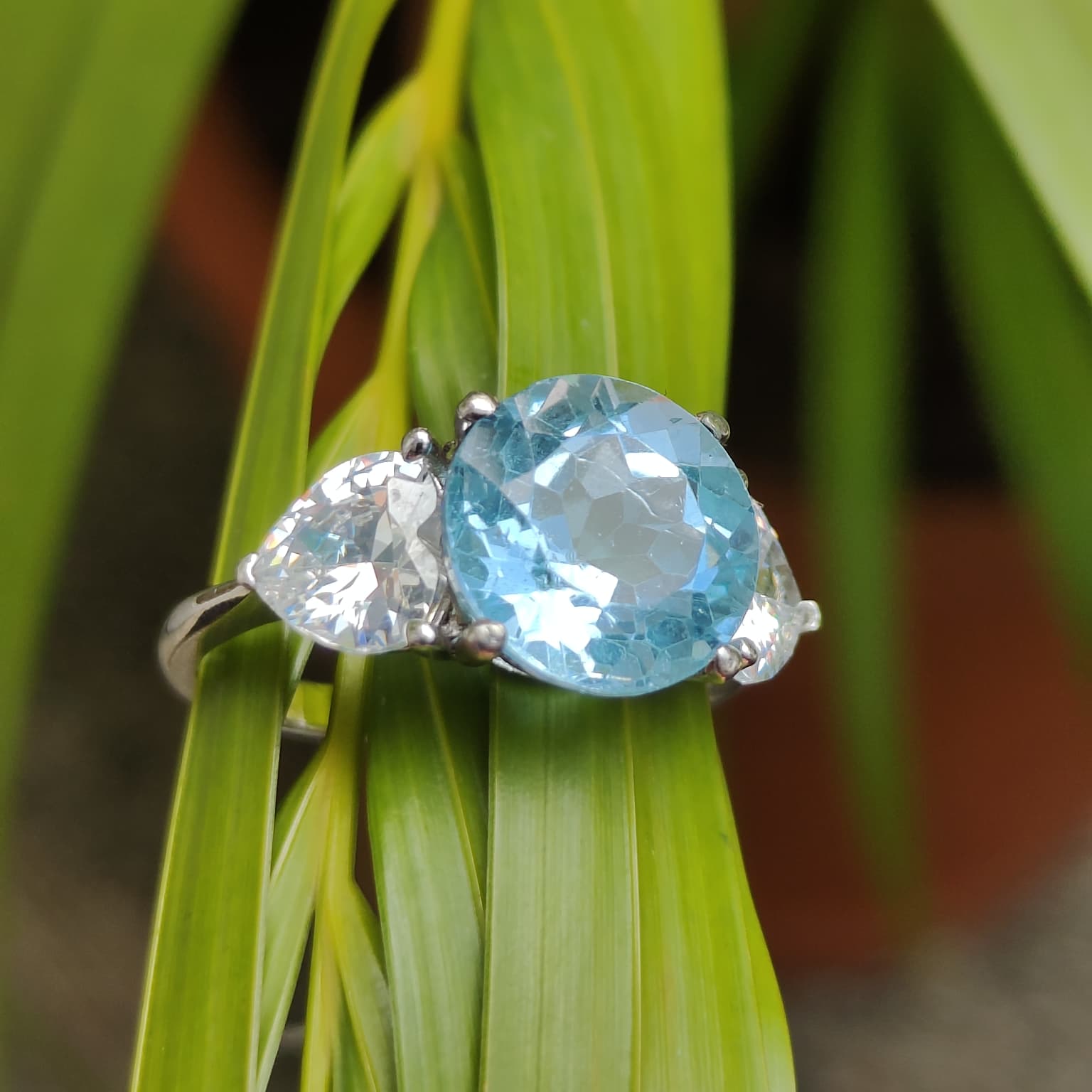 Classic Serenity: Natural Sky Blue Topaz Three-Stone Ring in 925 Silver