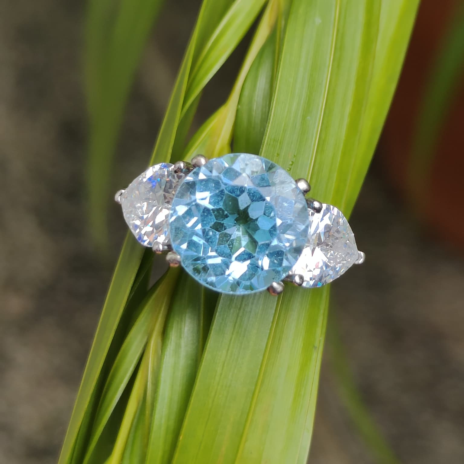 Classic Serenity: Natural Sky Blue Topaz Three-Stone Ring in 925 Silver