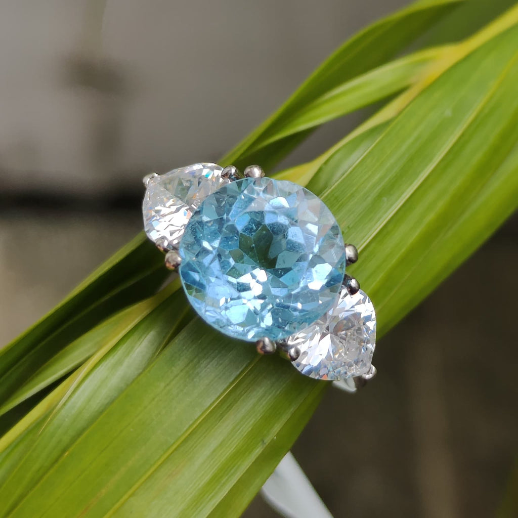 Classic Serenity: Natural Sky Blue Topaz Three-Stone Ring in 925 Silver