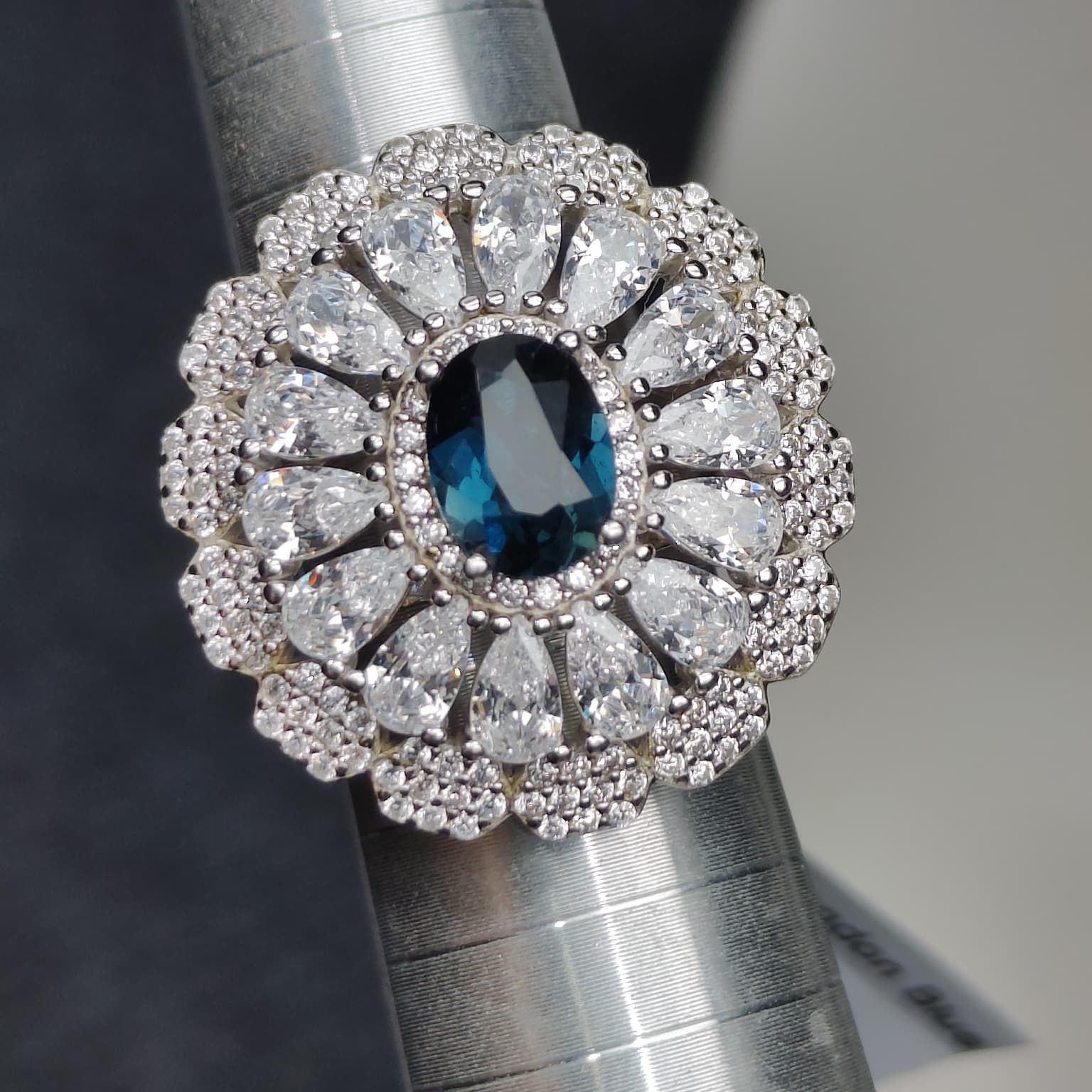 Midnight Bloom: Natural London Blue Topaz & CZ Petal Halo Statement Ring