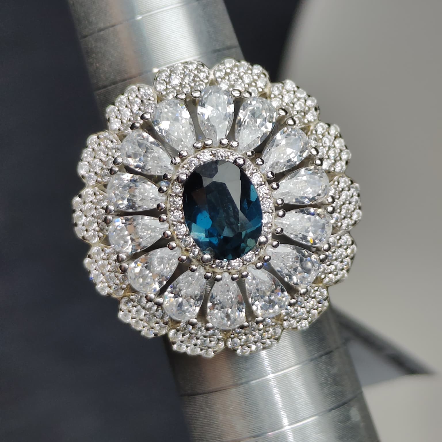 Midnight Bloom: Natural London Blue Topaz & CZ Petal Halo Statement Ring