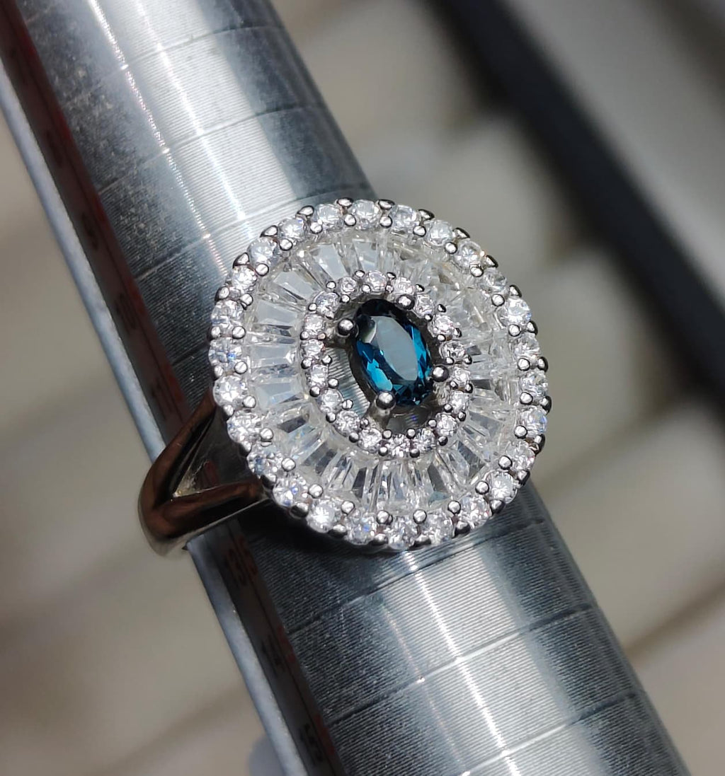 Midnight Sunburst: Natural London Blue Topaz Cocktail Ring with Baguette CZ Halo in 925 Silver