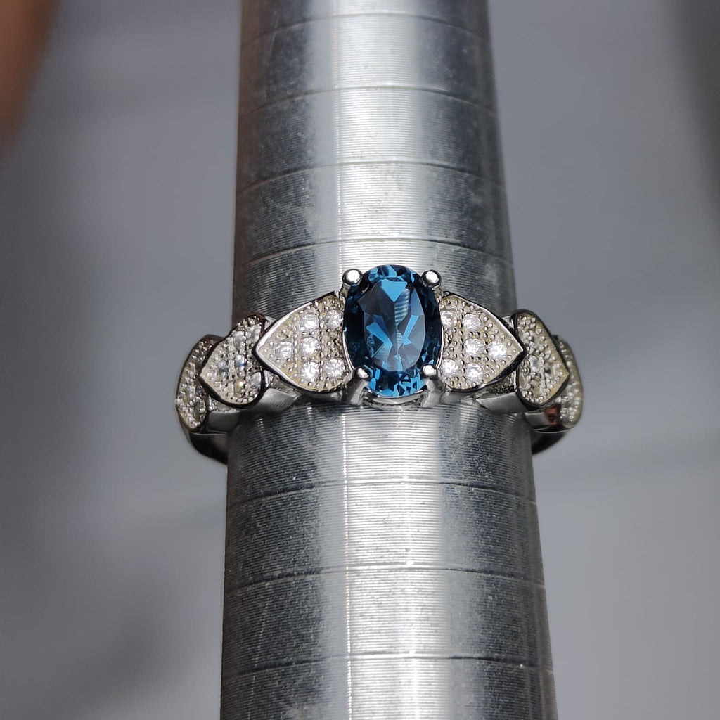 Ocean Heartbeat: Natural London Blue Topaz Ring with CZ Pavé Heart Accents in 925 Silver