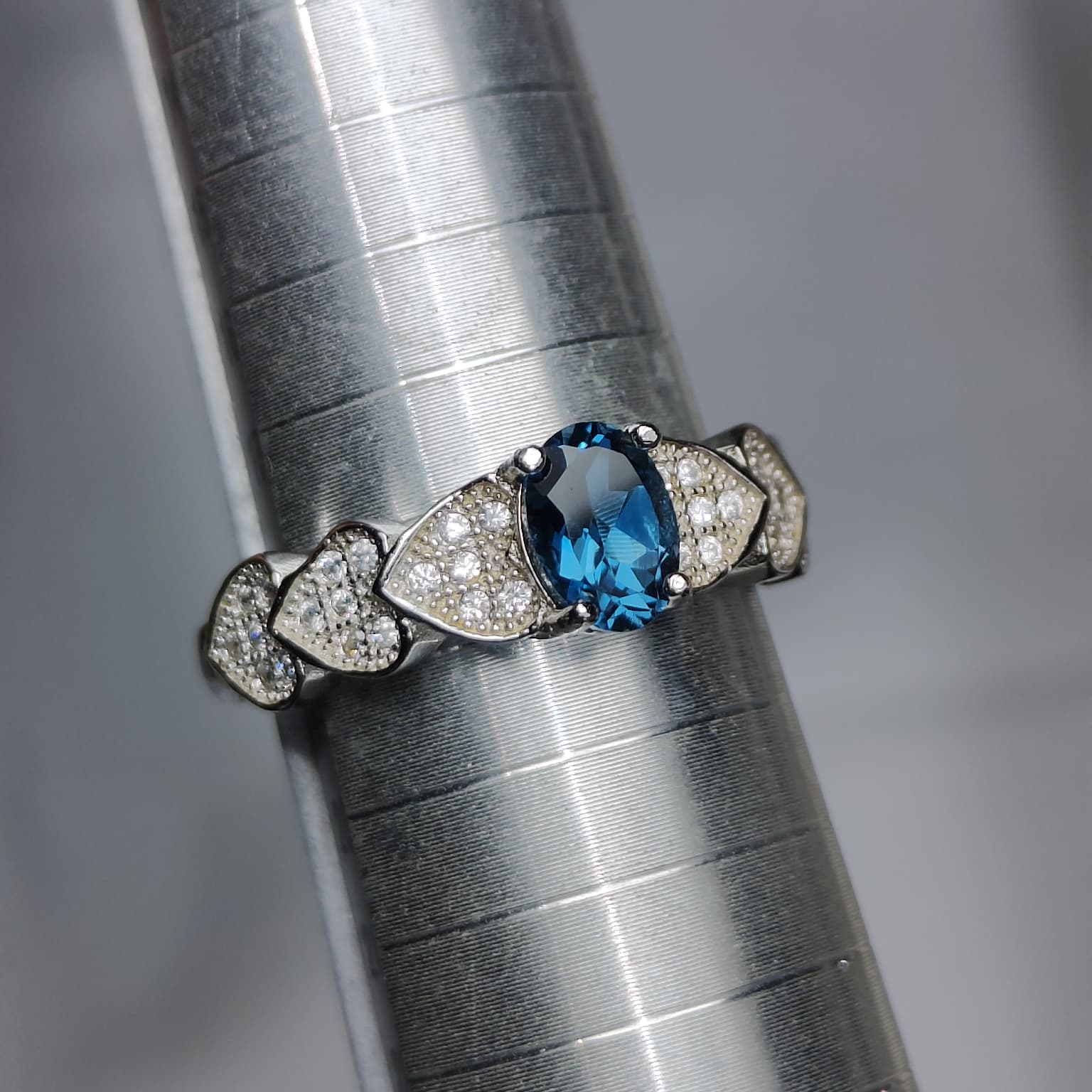Ocean Heartbeat: Natural London Blue Topaz Ring with CZ Pavé Heart Accents in 925 Silver
