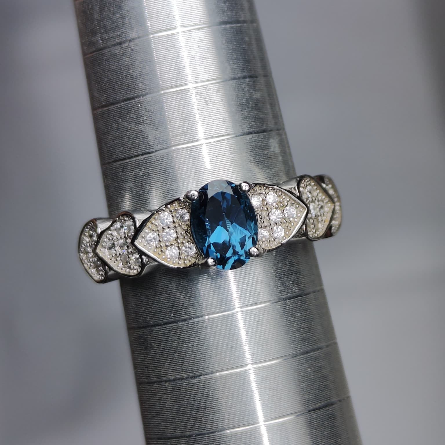 Ocean Heartbeat: Natural London Blue Topaz Ring with CZ Pavé Heart Accents in 925 Silver
