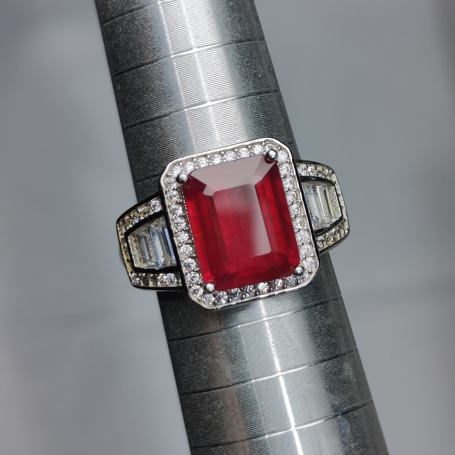 Crimson Statement: Natural Emerald-Cut Ruby Ring with Geometric CZ Halo in 925 Silver