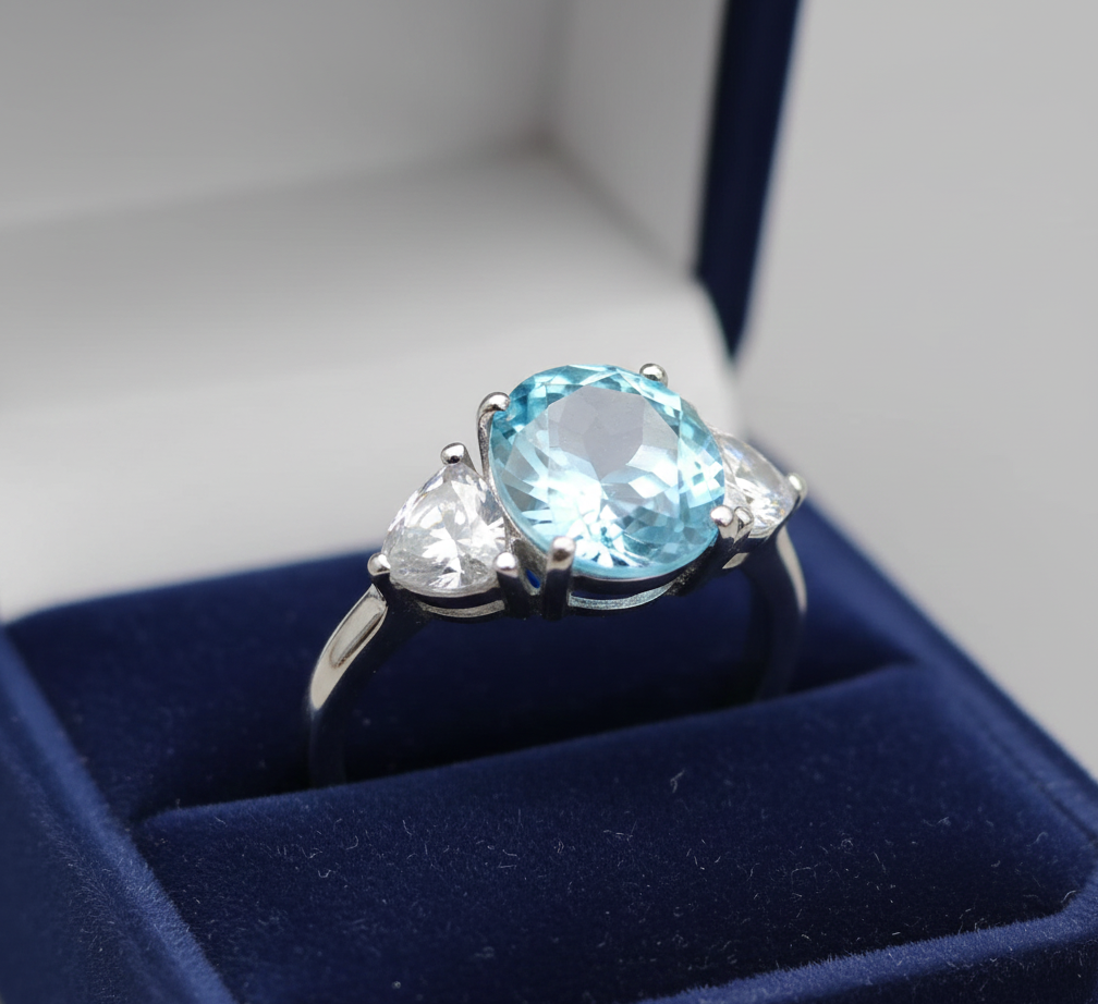 Classic Serenity: Natural Sky Blue Topaz Three-Stone Ring in 925 Silver
