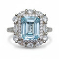 Iceberg Brilliance: Natural Sky Blue Topaz Emerald-Cut Ring with Marquise Halo in 925 Silver