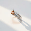 Mystic Shift: Natural Color Change Garnet Ring in 925 Silver with CZ Pavé Band