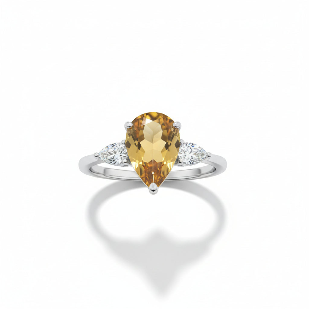 Natural Citrine Ring - Pear Cut Golden Yellow Gemstone with Cubic Zirconia Side Stones in Sterling Silver