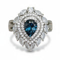Inky Depths: Natural London Blue Topaz & CZ Statement Ring with Marquise Halo