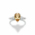 Natural Citrine Ring - Pear Cut Golden Yellow Gemstone with Cubic Zirconia Side Stones in Sterling Silver