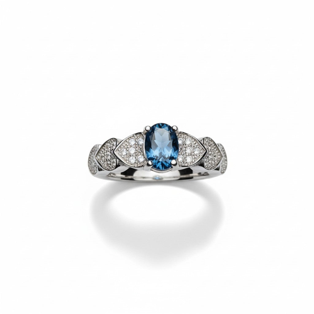 Ocean Heartbeat: Natural London Blue Topaz Ring with CZ Pavé Heart Accents in 925 Silver