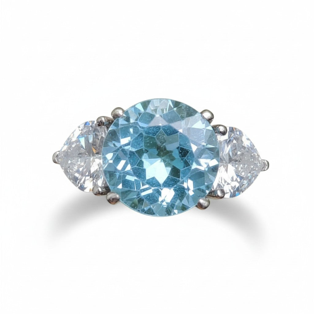 Classic Serenity: Natural Sky Blue Topaz Three-Stone Ring in 925 Silver