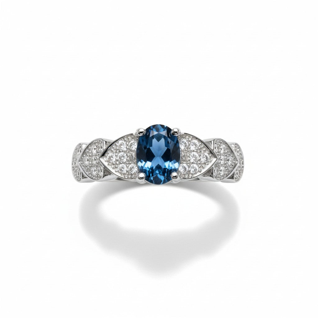 Ocean Heartbeat: Natural London Blue Topaz Ring with CZ Pavé Heart Accents in 925 Silver
