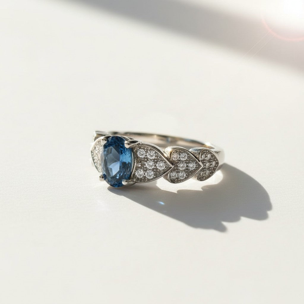 Ocean Heartbeat: Natural London Blue Topaz Ring with CZ Pavé Heart Accents in 925 Silver
