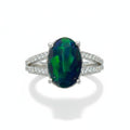 Aurora Borealis: Oval Black Opal Cocktail Ring with Pavé Split Band