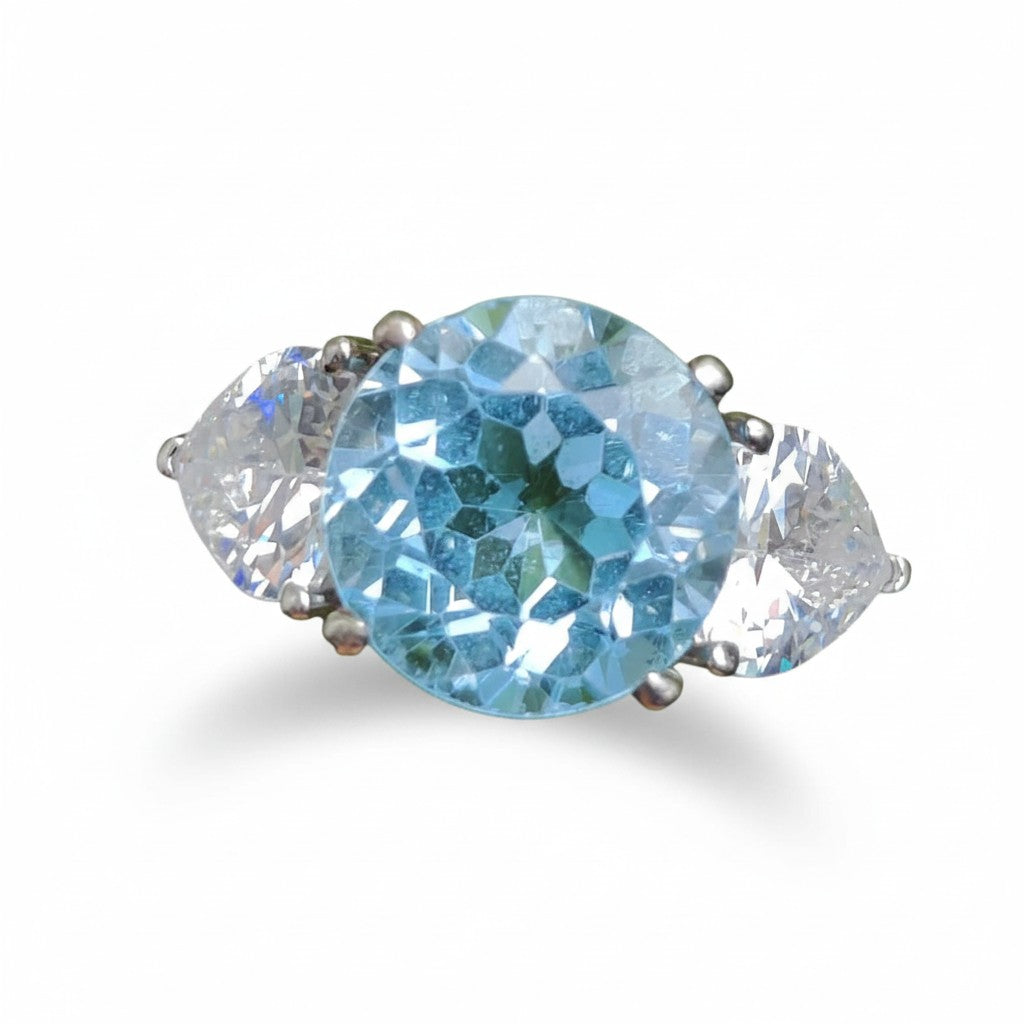 Classic Serenity: Natural Sky Blue Topaz Three-Stone Ring in 925 Silver