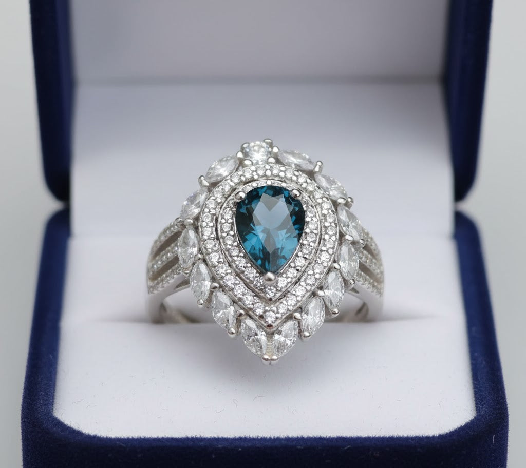 Inky Depths: Natural London Blue Topaz & CZ Statement Ring with Marquise Halo