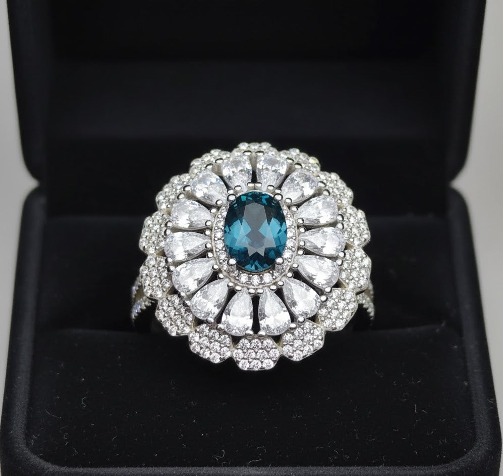Midnight Bloom: Natural London Blue Topaz & CZ Petal Halo Statement Ring