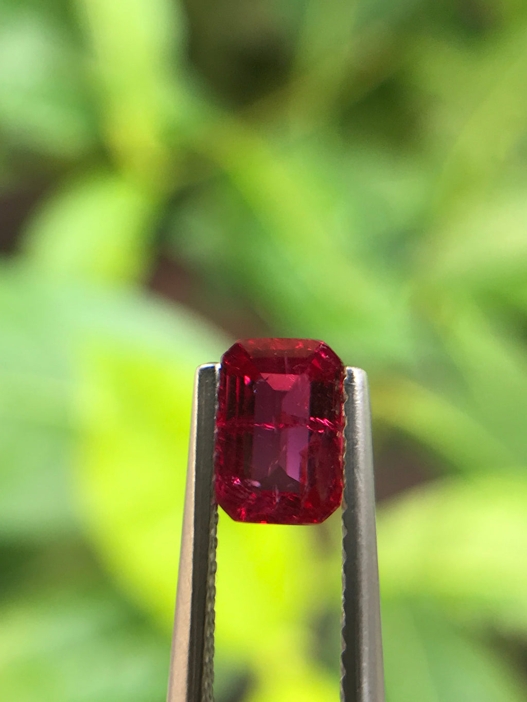 Shiza Gems 1.00 ct unheated Pigeon Blood ruby, emerald cut, vivid red, CGRL certified, Mozambique origin.