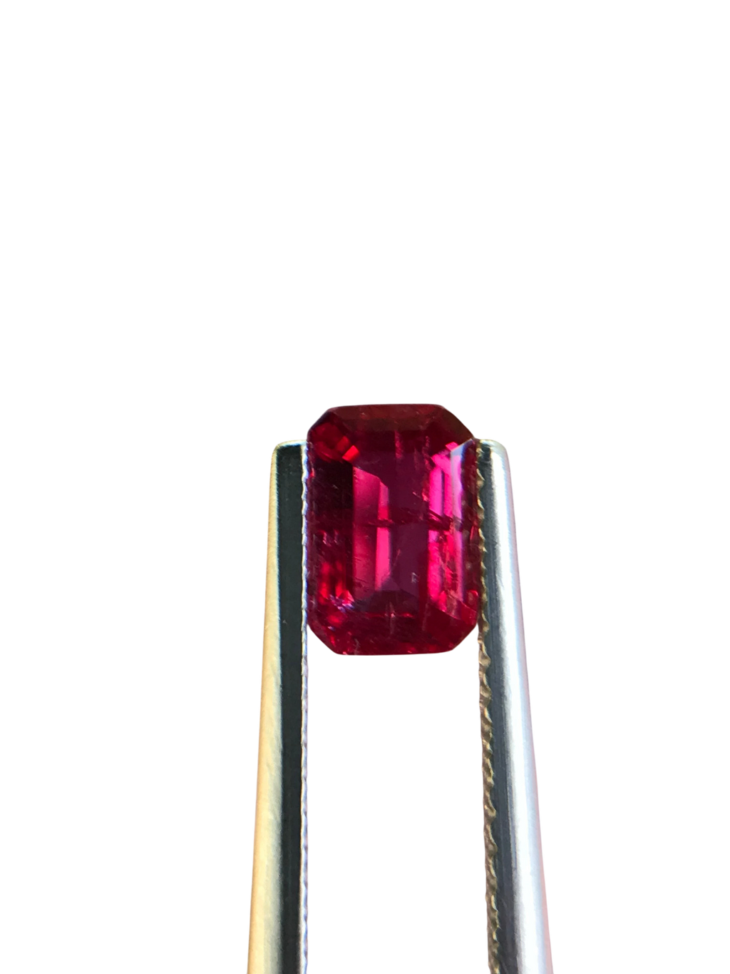 Shiza Gems 1.00 ct emerald cut vivid red Pigeon Blood ruby, unheated, CGRL certified, Mozambique origin.