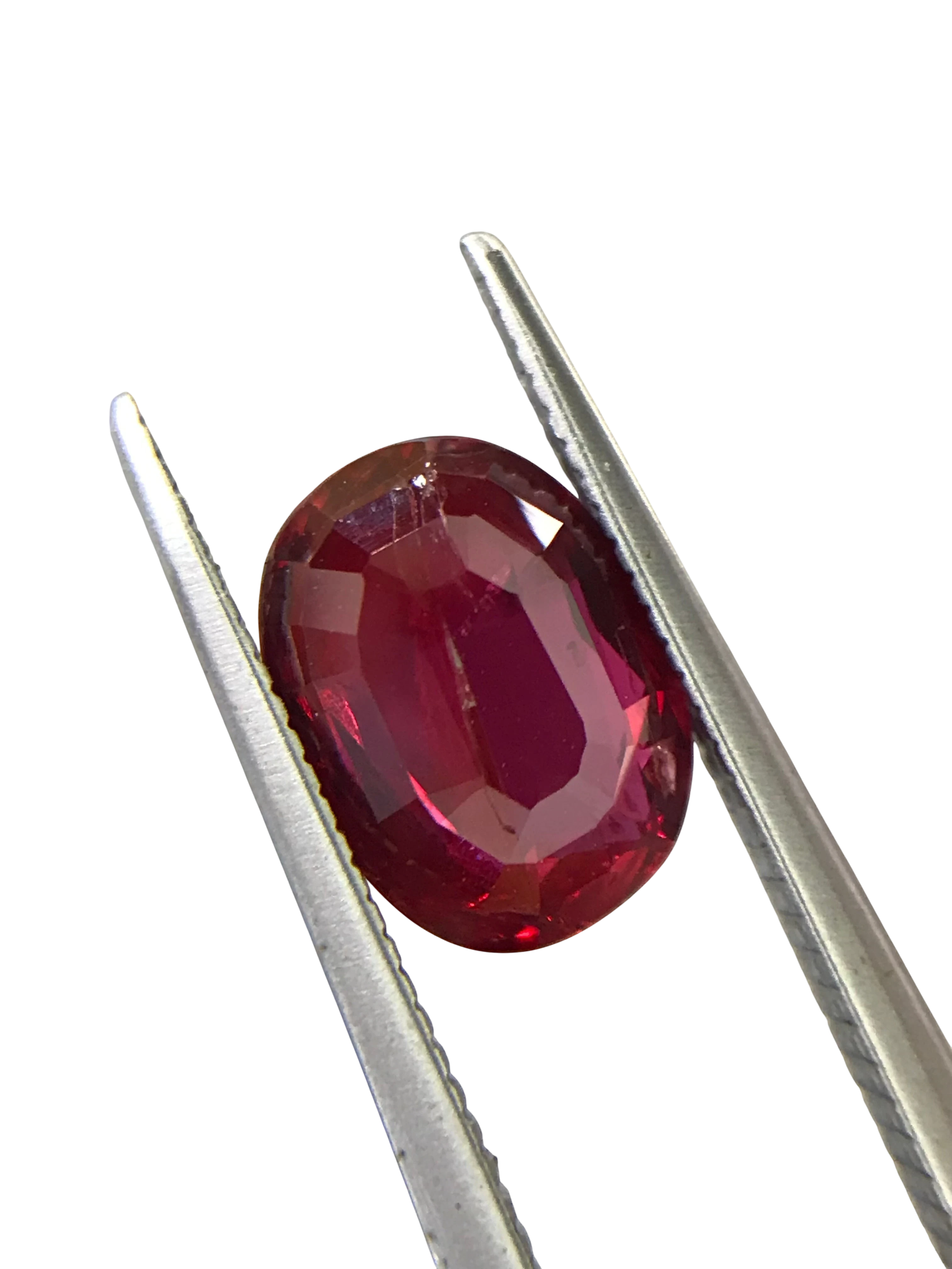 Shiza Gems 2.05 ct oval-cut natural unheated Pigeon Blood ruby, vivid red color, AIGS certified loose gemstone.
