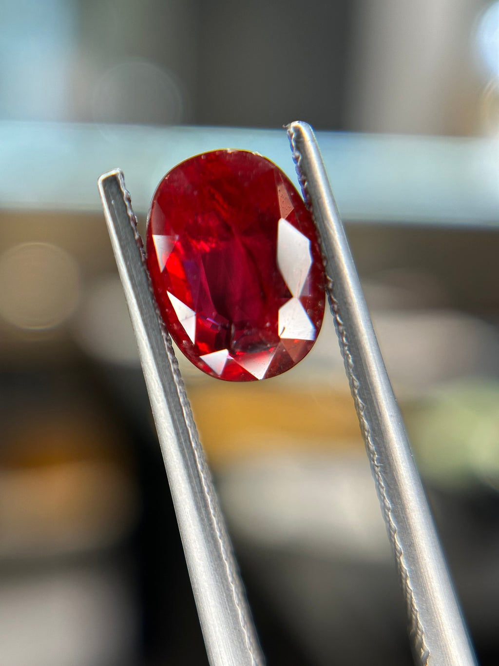 Shiza Gems 2.05 ct oval-cut natural unheated Pigeon Blood ruby, vivid red color, AIGS certified loose gemstone.