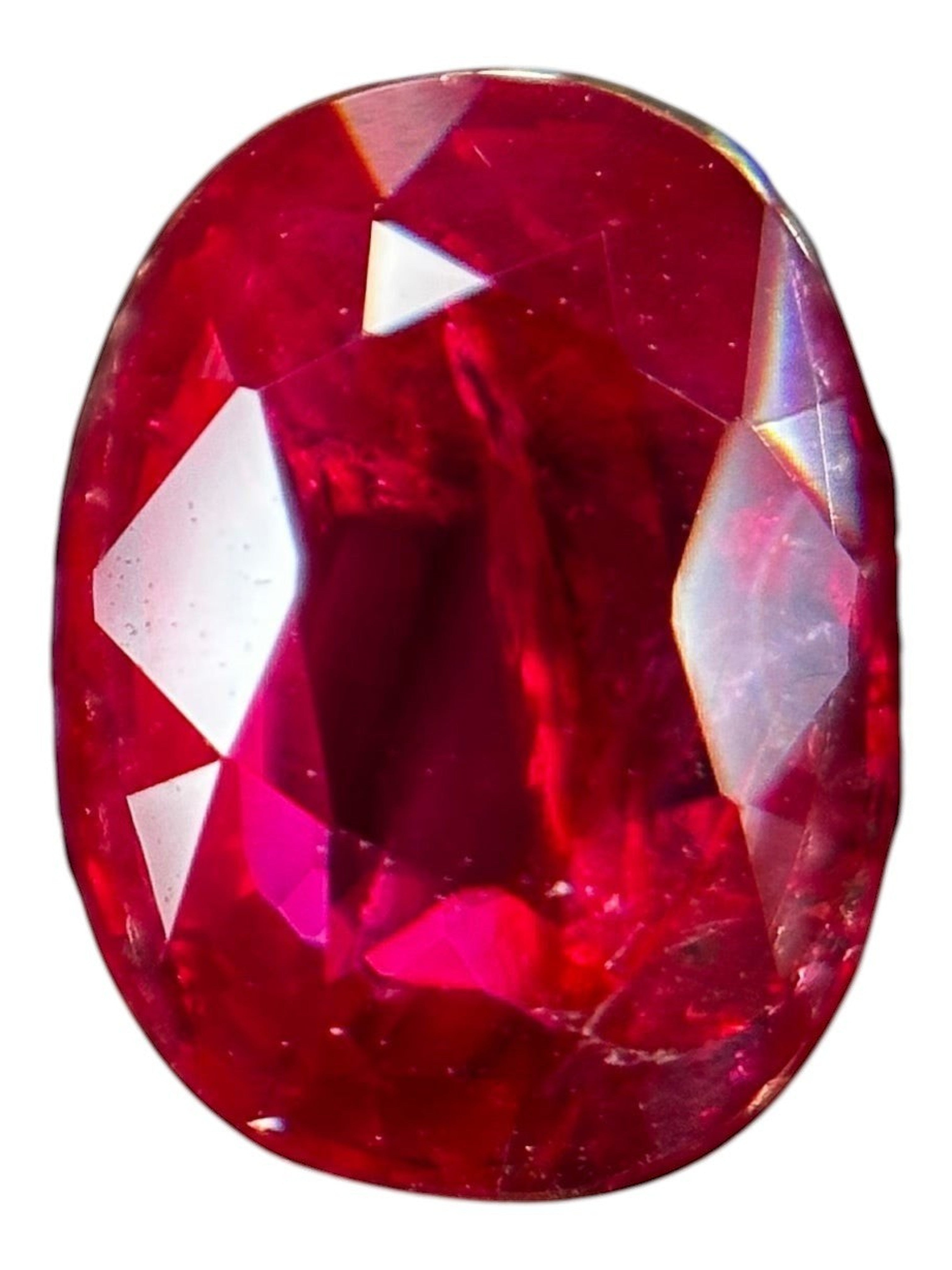 Shiza Gems 2.05 ct oval cut natural unheated Pigeon Blood ruby, vivid red color, AIGS certified loose gemstone.