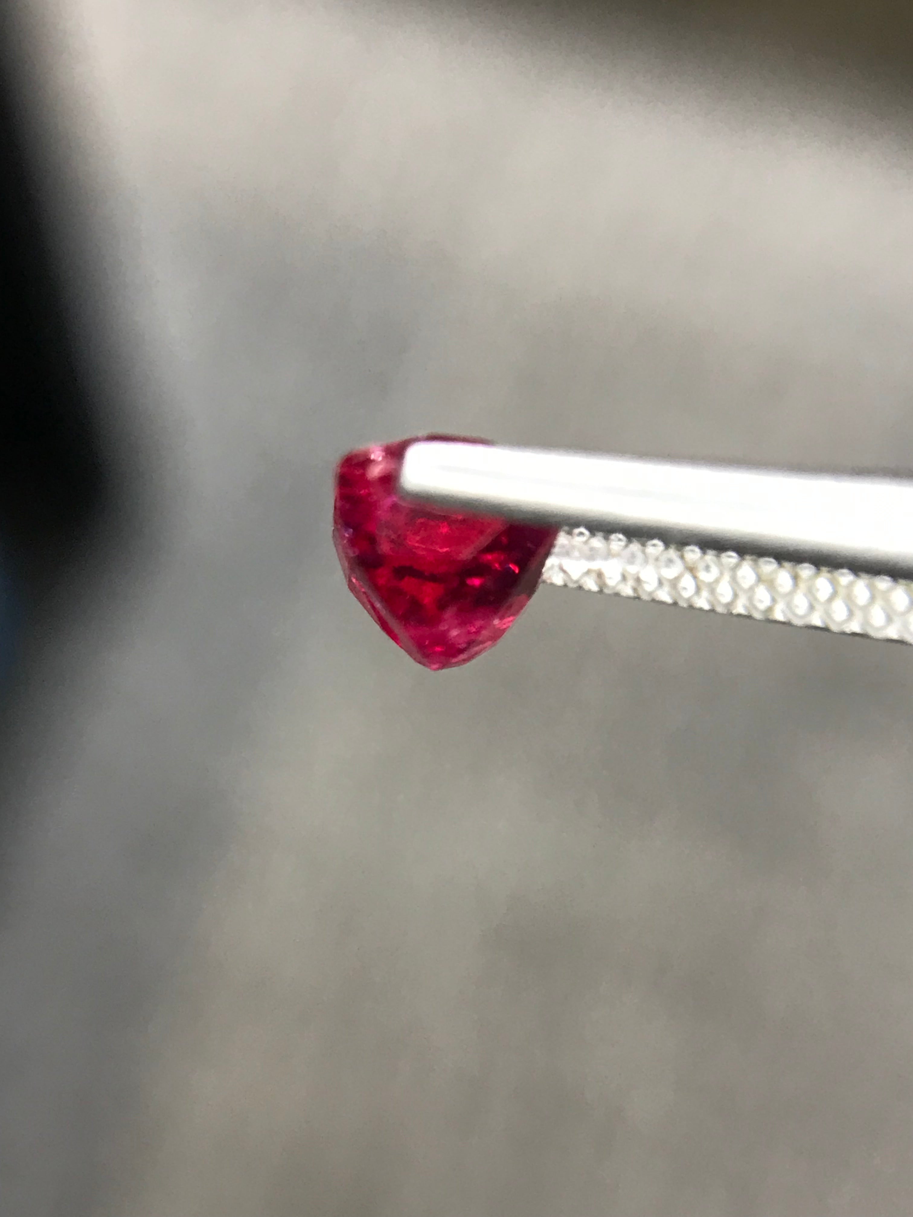 Shiza Gems 2.01 ct emerald cut vivid pinkish-red unheated ruby gemstone.