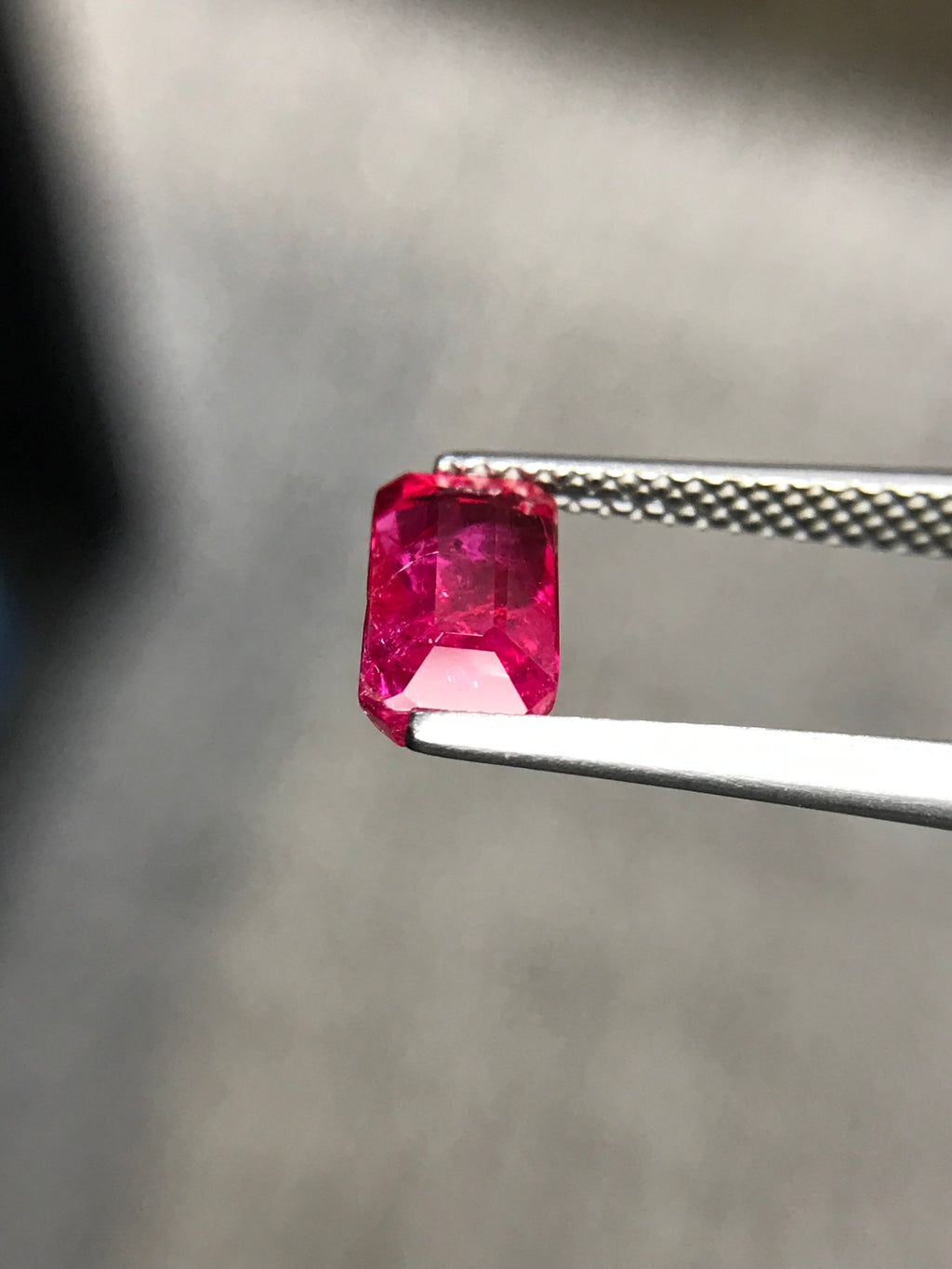 Shiza Gems 2.01 ct emerald cut vivid pinkish-red unheated ruby gemstone.