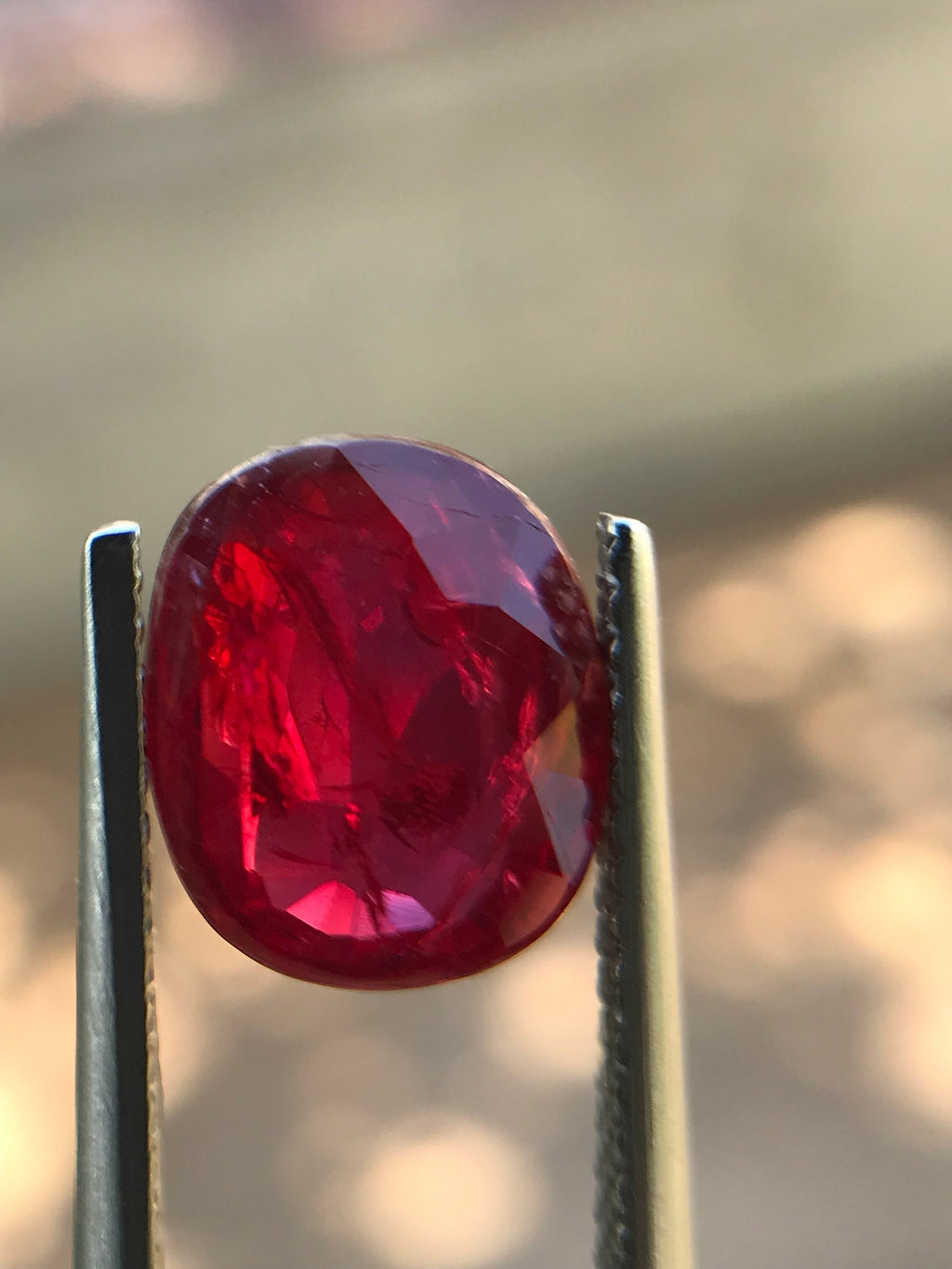 Shiza Gems 3.02 ct oval cut unheated ruby gemstone, vivid red color, natural brilliance.