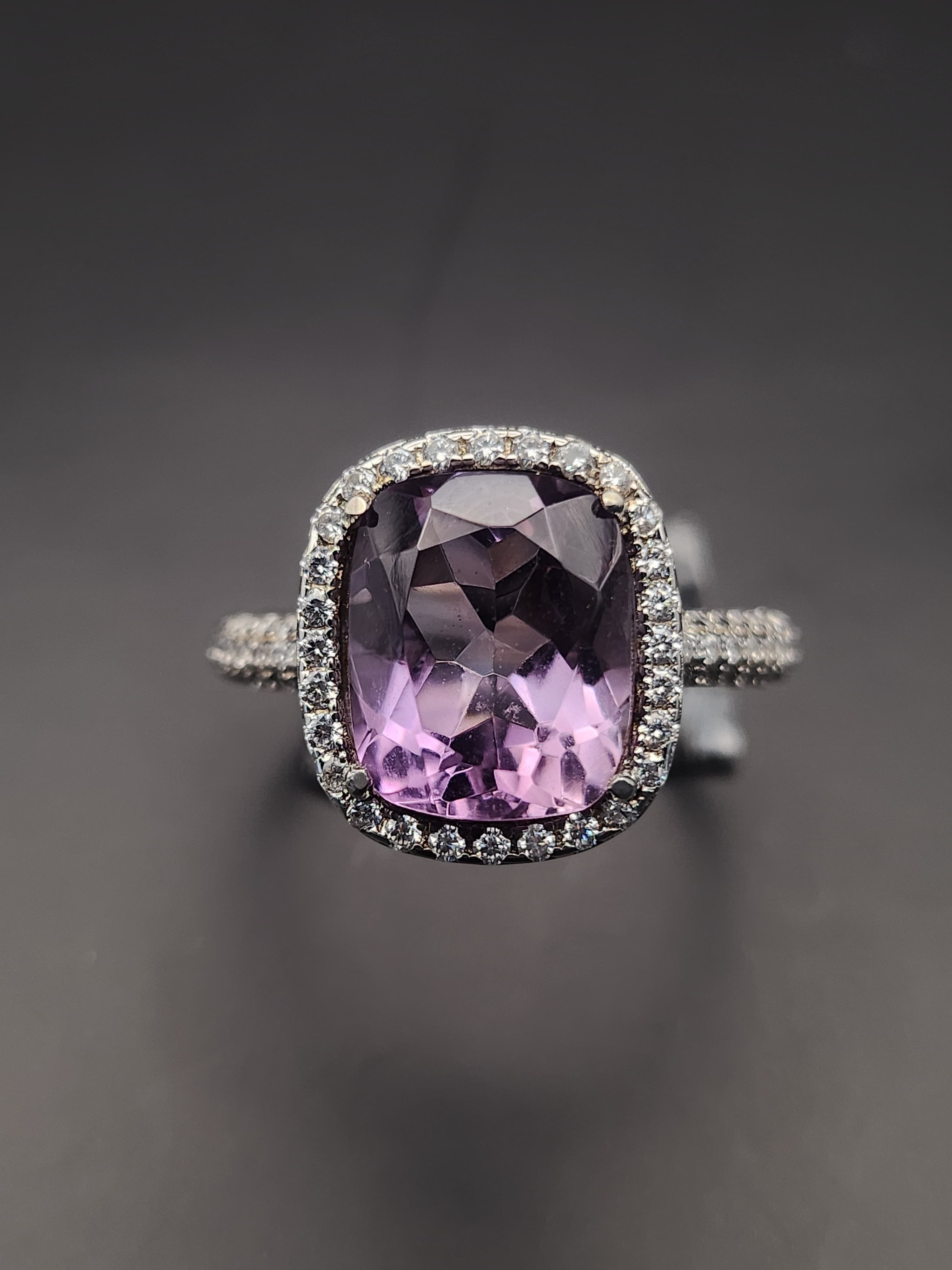 Shiza Gems natural cushion-cut amethyst ring with CZ halo in sterling silver. Soft lavender-purple gemstone with sparkling accents.