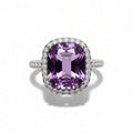 Shiza Gems cushion-cut amethyst ring with CZ halo in sterling silver. Soft lavender-purple gemstone with pavé band.