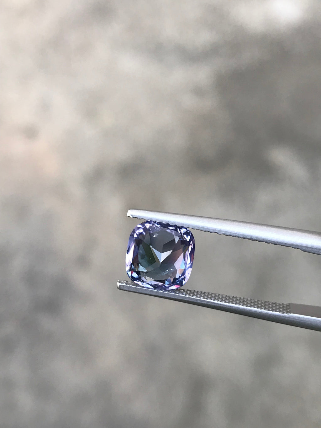 Shiza Gems 2.70 ct bi-color cushion cut spinel gemstone, teal-blue to lighter tones, faceted for brilliance.