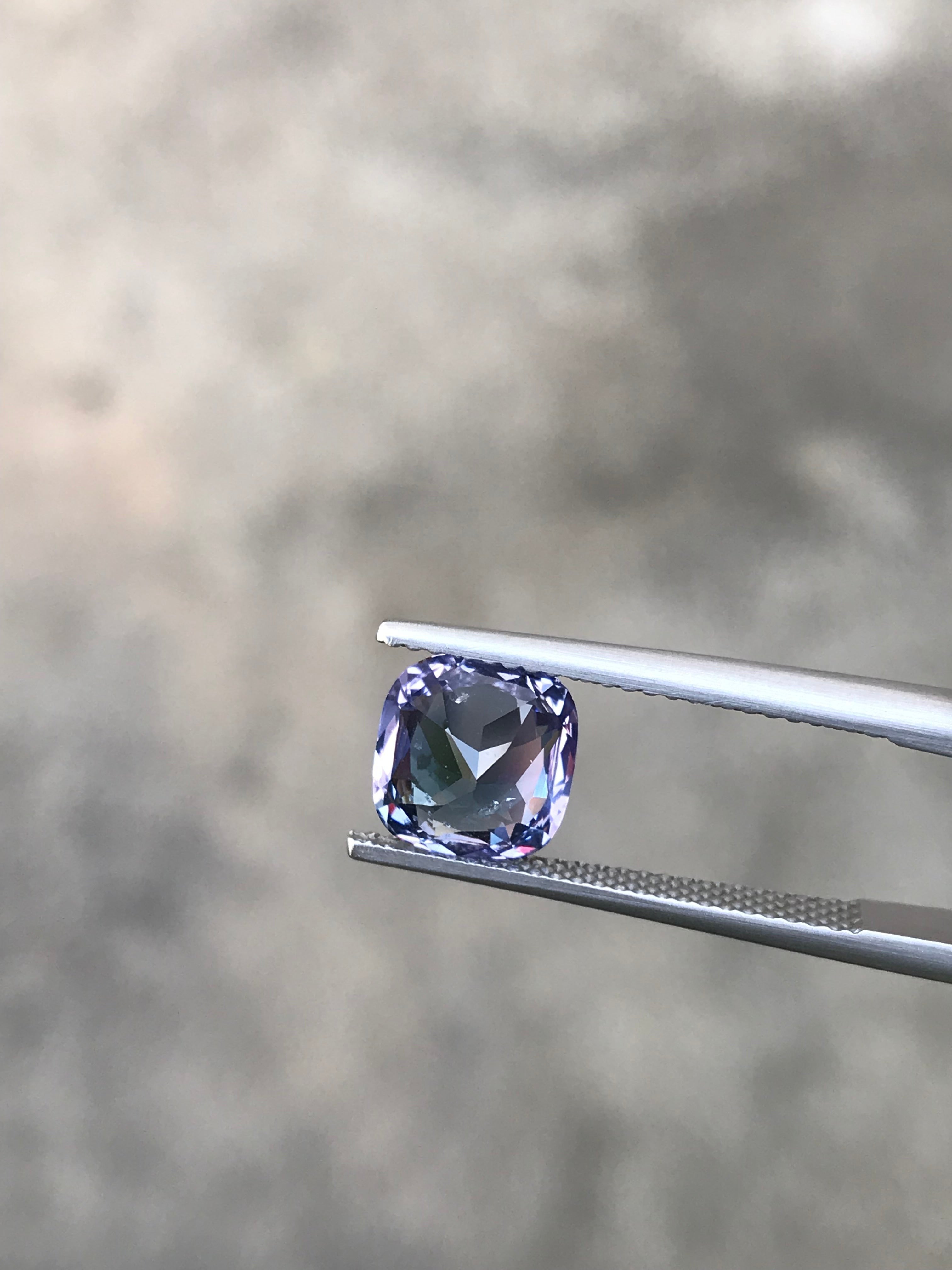 Shiza Gems 2.70 ct bi-color cushion cut spinel gemstone, teal-blue to lighter tones, faceted for brilliance.