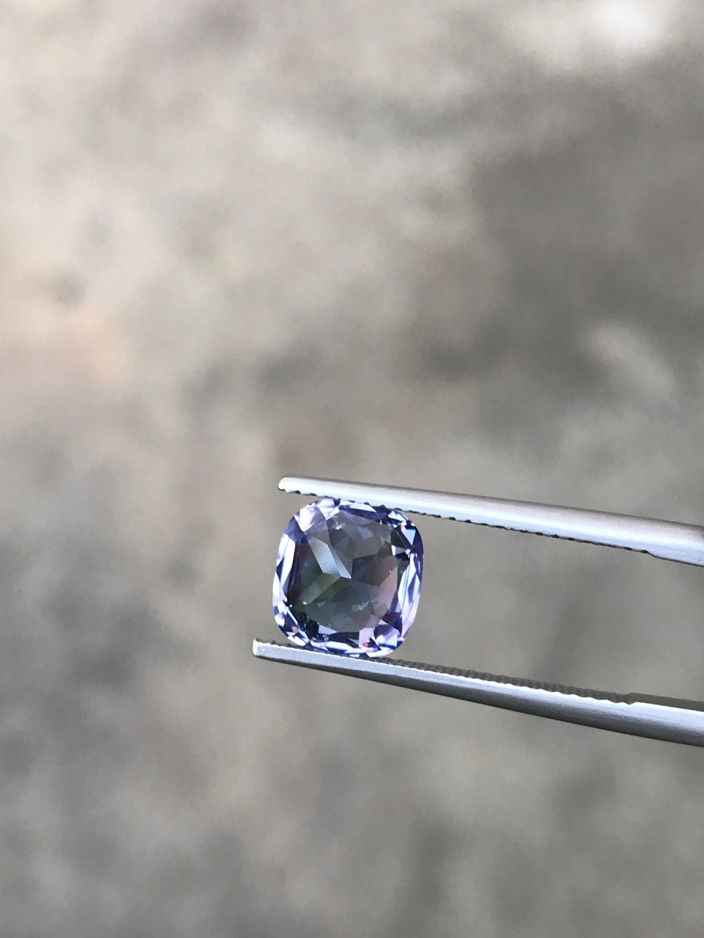 Shiza Gems 2.70 ct bi-color cushion cut spinel gemstone, teal-blue to lighter tones, faceted for brilliance.
