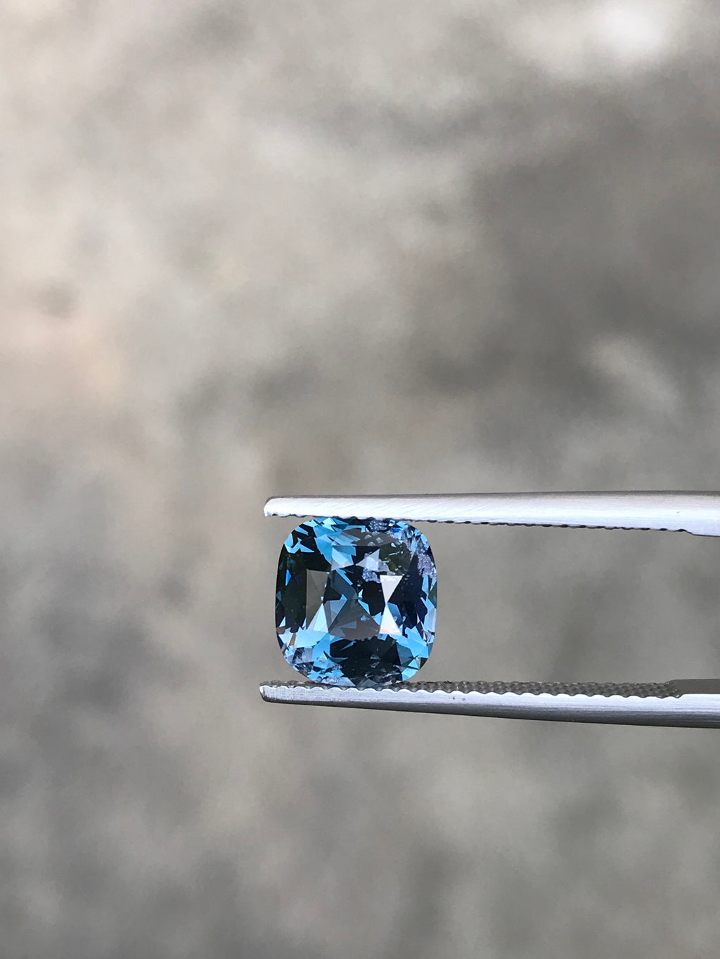 Shiza Gems 2.70 ct bi-color cushion cut blue teal spinel gemstone with exceptional brilliance and natural fire.