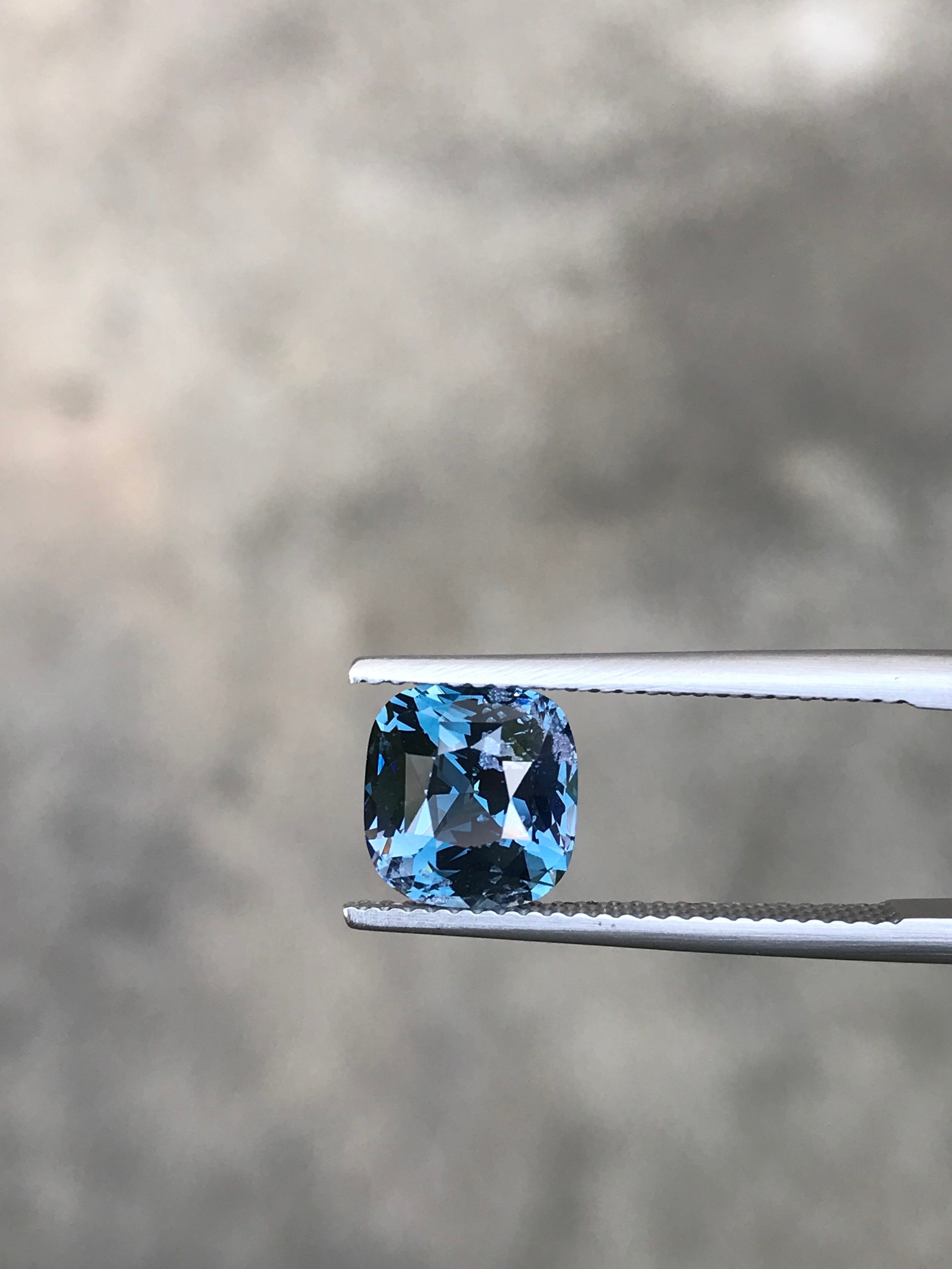 Shiza Gems 2.70 ct bi-color cushion cut blue teal spinel gemstone with exceptional brilliance and natural fire.